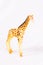 Toy tall cute giraffe looks realistic