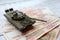 Toy tank on the russian banknotes 5000 roubles crisis risk sanctions war conflict russia ukraine wallpaper