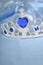 Toy tiara with diamonds and blue gem
