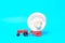 Toy tractor carries a large white button mushroom