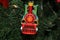 Toy train Christmas ornament hanging in tree