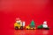 Toy truck carry Christmas ornament. Delivery of Christmas service