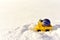 Toy truck with a Christmas ball on background of white snow in forest. Ð¡oncept of preparing for the celebration of New Year.