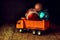 Toy truck with Christmas balls. Delivery of Christmas gifts by transport and courier service