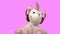 Toy unicorn dancing against pink