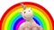 Toy unicorn dancing with rainbow