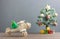 Toy wood airplane transfer fir tree with Blur Christmas tree & many beautiful gift box also essential decoration accessory.