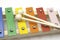 Toy xylophone on white