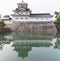 Toyama castle with reflection in water, castle historic landmark