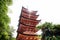 Toyokuni shrine five-story pagoda low angle with sun beam, Miyajima, Japan