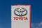 Toyota logo on promotional stand at sunny day - Toyota Motor Corporation is a Japanese automotive manufacturer.