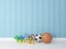 Toys with blue wooden background