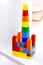 Toys for kids. Bright plastic building blocks educational cubes constructor and children`s pyramid for games for preschoolers on