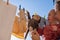 Toys monkey and teddy bear are dried on a clothesline after washing