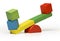 Toys seesaw wooden blocks, teeter totter on white backg