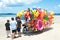 Toys shop and child on the beach in Eastern Thailand.