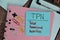 TPN - Total Parental Nutrition write on sticky notes isolated on Wooden Table