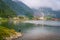 Trabzon / Turkey - August 07 2019: Panoramic view of Uzungol which is a tourist attraction in Turkey. Fisher and paddle boats in