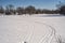 Trace of snowmobile on a river