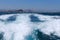 Trace tail of speed boat on water surface in the sea-nature and sport background.