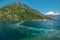 Trace on the water on a motorboat, in the background a small town Perast, Bay of Kotor Boka Kotorska, Montenegro. View from the