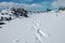 Traces Of Hiker With Snowshoes Prints In The Fresh Snow