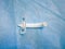 Tracheostomy tube close-up. For emergency care, help close-up. View from above. operation and medicine. Surgeon\'s tool. scissors