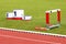 Track lanes, winner\'s podium, hurdles