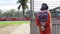 Track Marshal following the course from a stationed point in the Australian Grand Prix, Melbourne