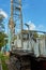 Tracked drilling rig with mounted drilling tower for exploratory drilling