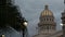 Tracking Passed Tropical Tree Revealing Dome Of Cuba Capitol Building And Flag