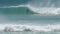 Tracking shot of a bodyboarder surfing at kirra on the gold coast of queensland