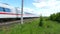 Tracking shot of a passing ICE train on the highspeed line Frankfurt - Cologne near Wallau
