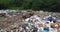 A tract on a large landfill. The polluted ecosphere of the Carpathian Mountains.