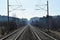 Traction power line rail corridor. Railroad tracks. In the distance tunnel