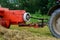Tractor and cardan shaft for coupling equipment, tractor in the field during haymaking