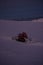 Tractor cleaning snow on the ski slopes in the Alps