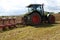 Tractor closeup plow furrow agriculture field