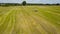 Tractor Collecting Straw Bales