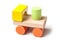 Tractor on colorful wooden blocks on white background