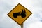 Tractor Crossing Warning or Tractor Ahead Sign in Miyako island, Okinawa, Japan