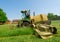 Tractor cutting grass meadow