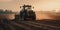 Tractor driving across large field making special beds for sowing seeds into purified soil.