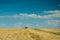 Tractor driving on stubble