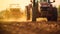 a tractor in a dusty field harvests or sows