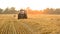 Tractor with farmer on the field.