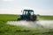 Tractor fertilize field pesticide and insecticide