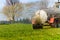 Tractor fertilizes with manure a field