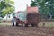 Tractor fertilizing field with dunk