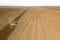 Tractor Field Preparation to plant, aerial view. Field cultivation.